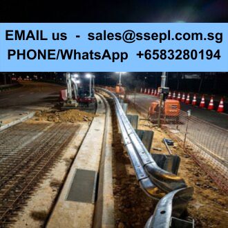Night construction on railway tracks with orange cones; blue banner lists contact email sales@ssepl.com.sg and phone +65 83280194.
